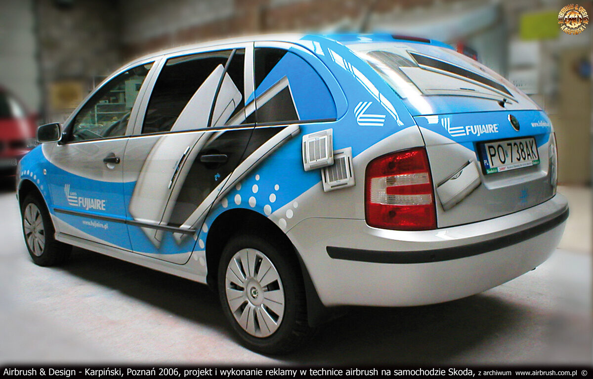 Projekt i wykonanie reklamy w technice airbrush na samochodzie Skoda dla firmy Lars.