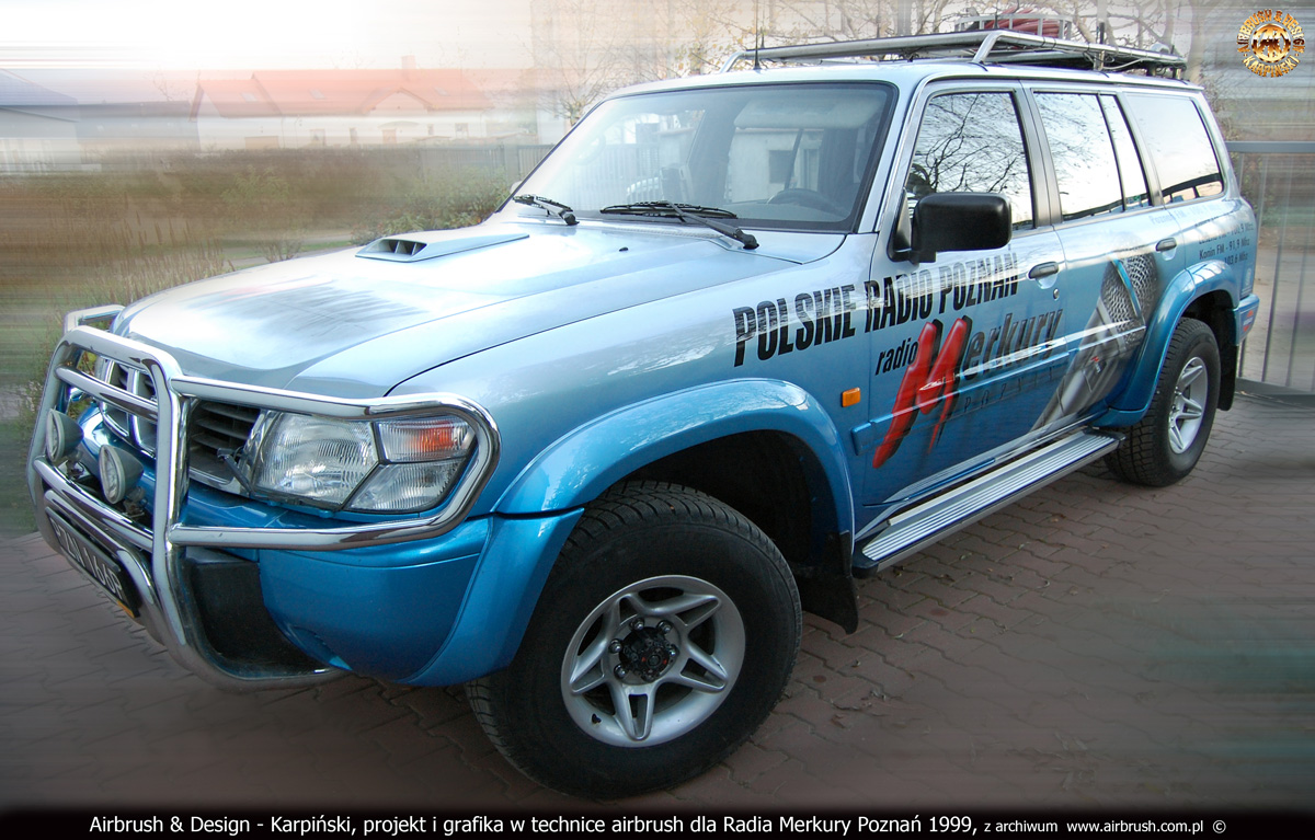 Projekt i wykonanie reklamy na samochodzie wozie transmisyjnym Radia Poznań 1999.