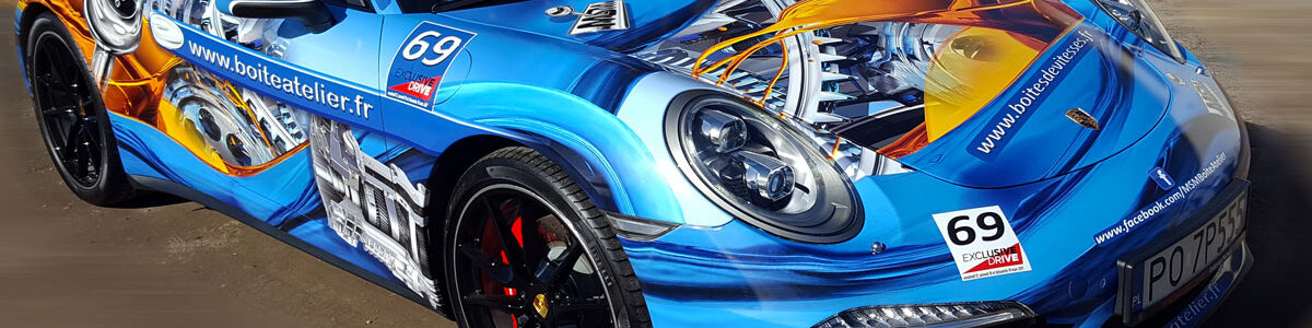 Projekt i wykonanie reklamy na samochodzie Porsche 911.