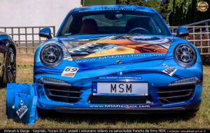 Projekt i wykonanie reklamy na samochodzie Porsche 911.