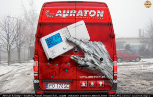 Projekt i wykonanie reklamy w technice airbrush IronMan na samochodzie firmy Lars 2011 r.