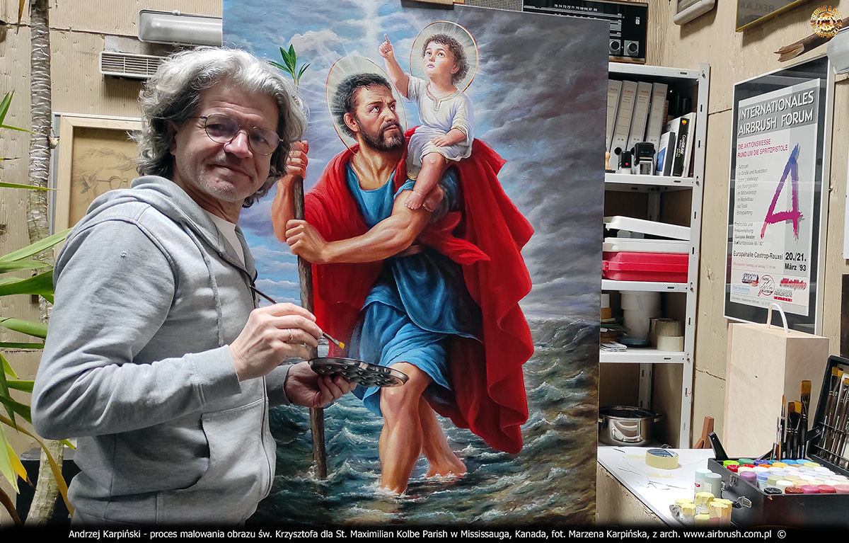 Obraz na płótnie o wymiarach 83x125cm przedstawiający świętego Krzysztofa dla kościoła pw. św. Maksymiliana Kolbe w Mississauga, Toronto malowany przez Andrzeja Karpińskiego ze Skórzewa koło Poznania w marcu 2026 roku.